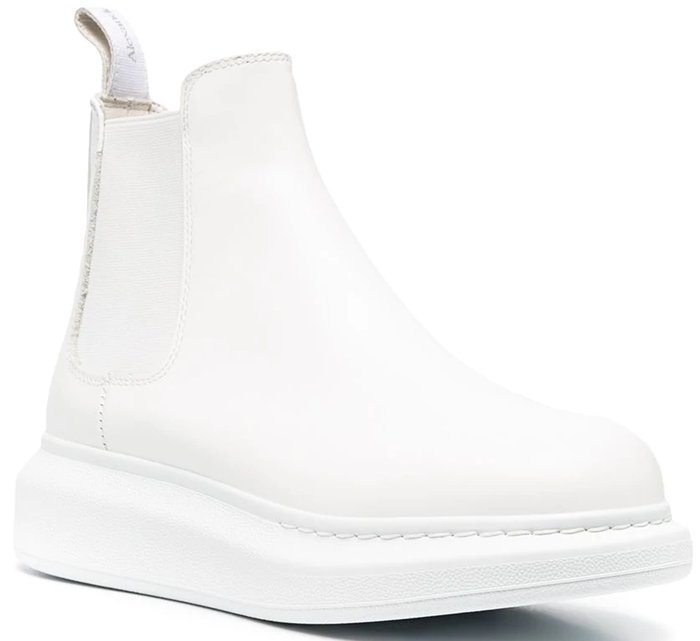 Set on bouncy rubber soles, Alexander McQueen's ankle boots have stretchy side panels and a handy pull tab to make them easily slip on and off