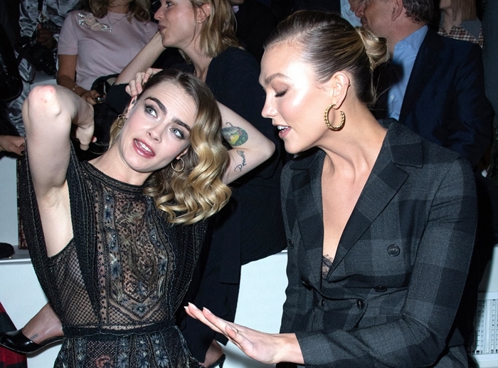 Cara Delevingne and Karlie Kloss attend the Dior show as part of the Paris Fashion Week Womenswear Fall/Winter 2020/2021