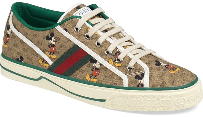 Gucci celebrates Mickey Mouse with a canvas sneaker that combines the cartoon's nostalgic charm with the fashion house's own heritage