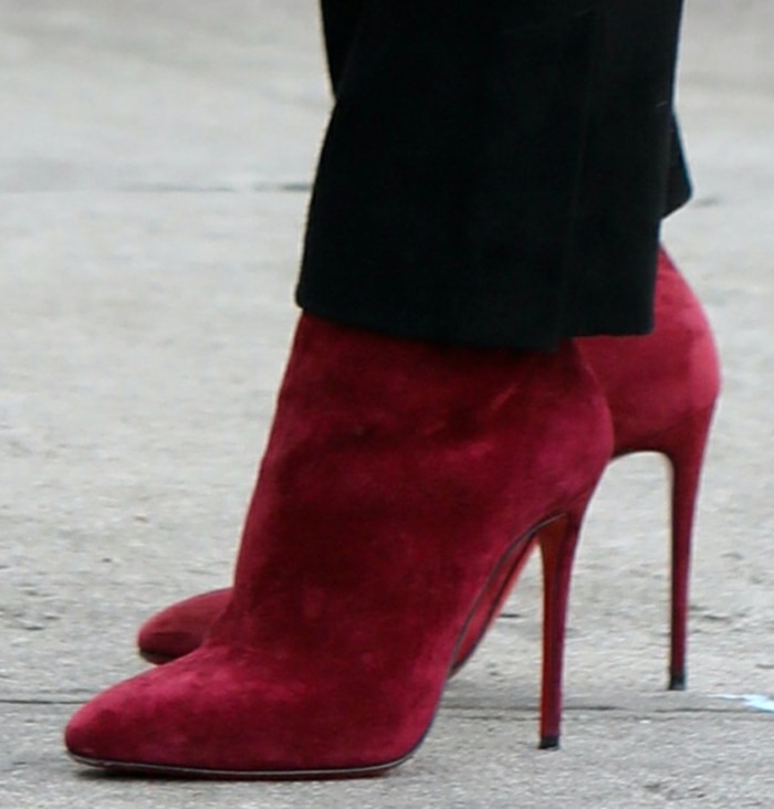 Hilary Duff adds a pop of red to her look with Christian Louboutin Eloise booties