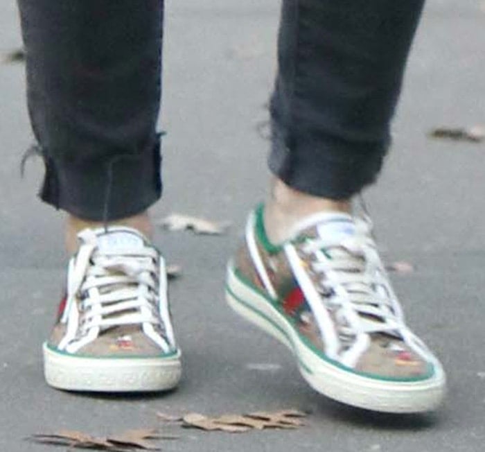 Hilary Duff wearing Gucci and Disney's 1977 GG print tennis sneakers