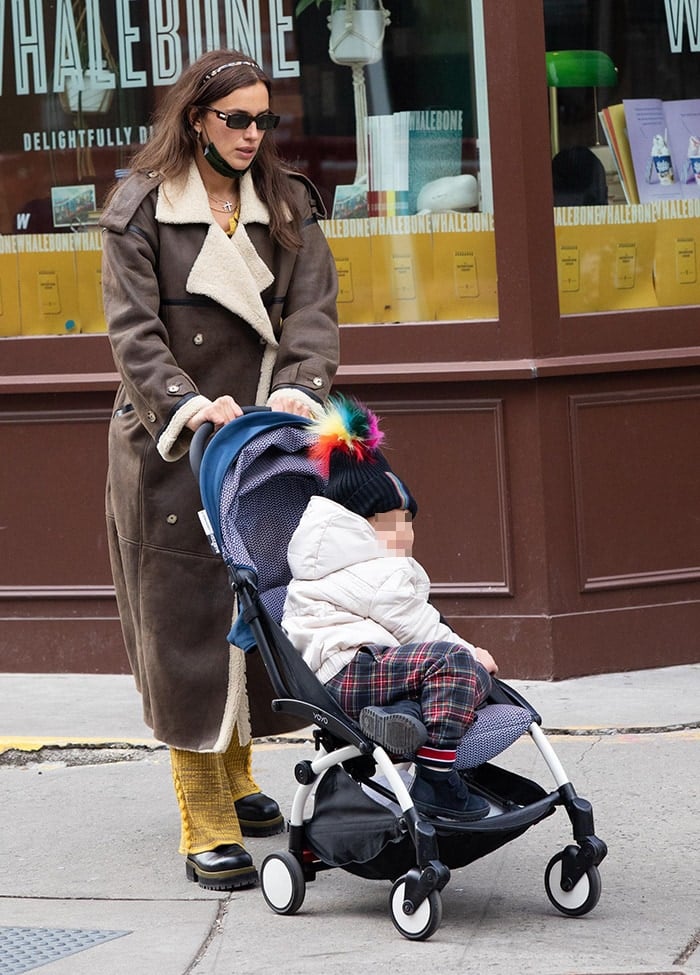 Irina Shayk bundles up in a chic The Mannei Jordan brown leather overcoat