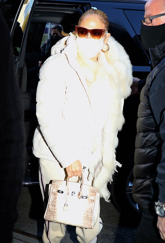 Jennifer Lopez carries one of the rarest Hermès Birkin Himalaya Blanc crocodile bag