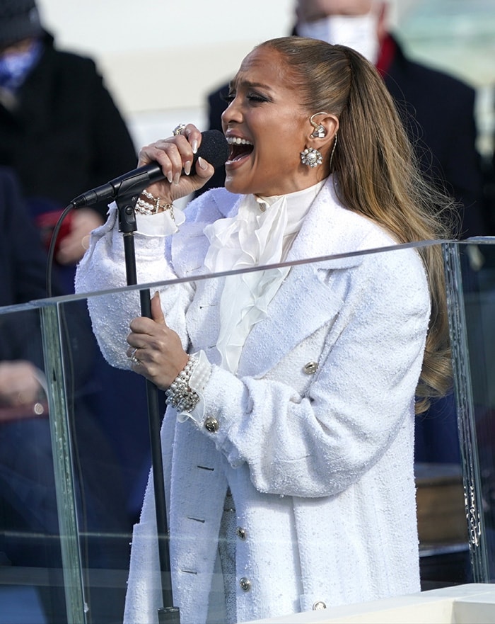 Jennifer Lopez performs This Land Is Your Land and America the Beautiful at the 2021 Presidential Inauguration on January 20, 2021