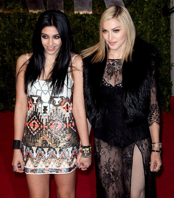 Madonna with daughter Lourdes Leon, sharing striking eyes and style at the 2011 Vanity Fair Oscar Party