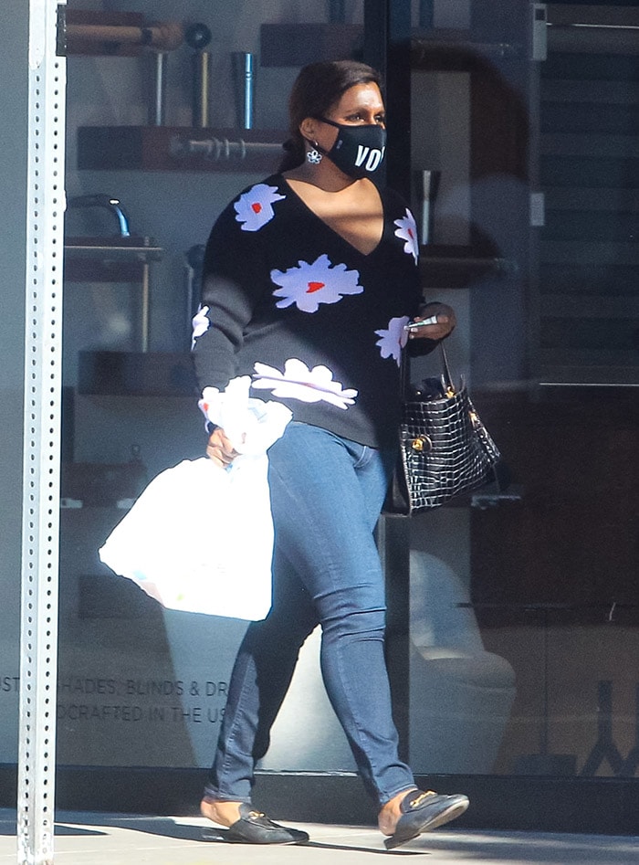 Mindy Kaling runs errands in Chinti & Parker floral sweater in West Hollywood on December 25, 2020
