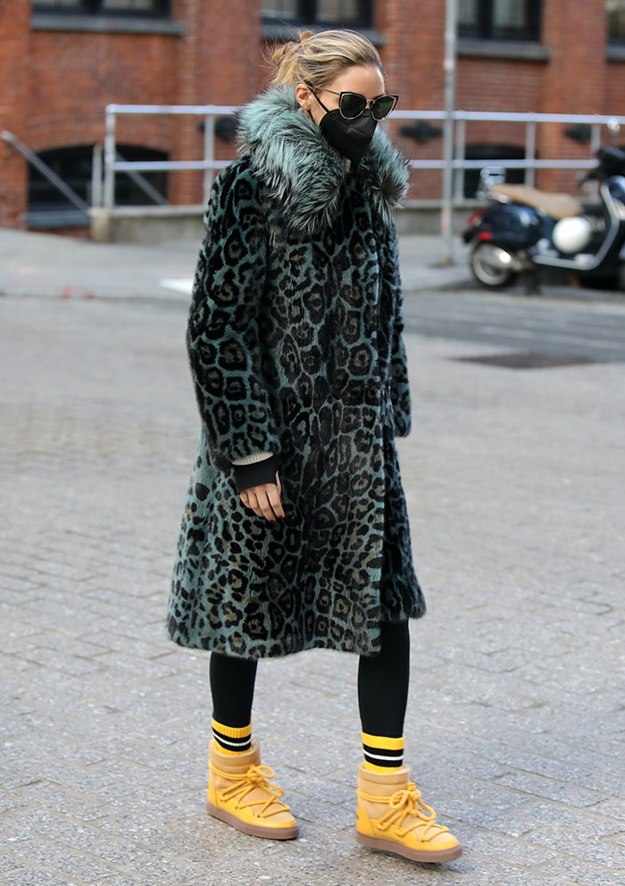 Olivia Palermo turns heads in a teal Cara Mila leopard mink fur coat and yellow boots