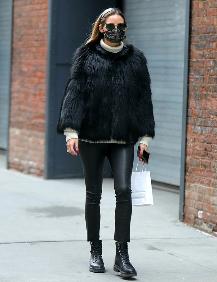 Olivia Palermo teams a black Pologeorgis shaggy jacket with black pleather pants