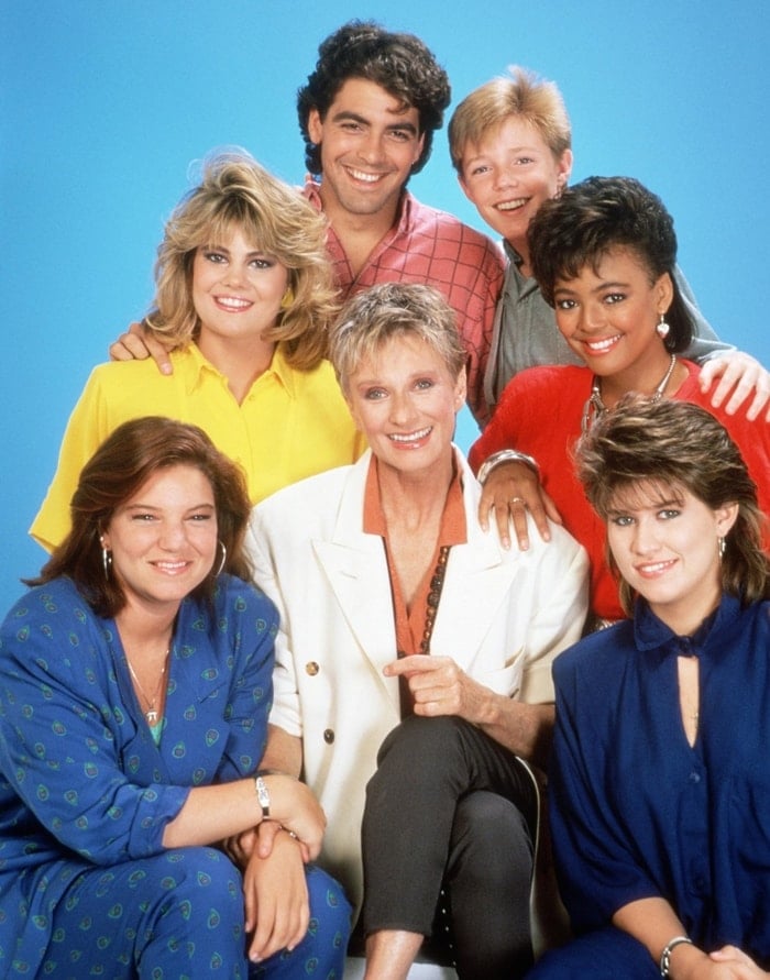 American television sitcom The Facts of Life cast members Lisa Whelchel (as Blair Warner), George Clooney (as George Burnett), MacKenzie Astin (as Andy Moffet), Kim Fields (as Dorothy "Tootie" Ramsey), seated, Mindy Cohn (as Natalie Green), Cloris Leachman (as Beverly Ann Stickle), Nancy McKeon (as Joanne "Jo" Polniaczek)