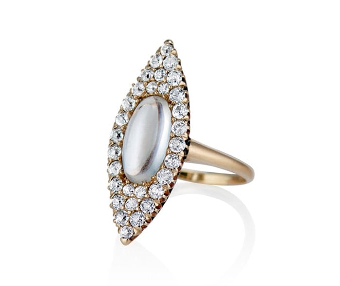 Set in 15k gold metal band, the Moon & Stars ring showcases moonstone and diamond that weigh about 1ct