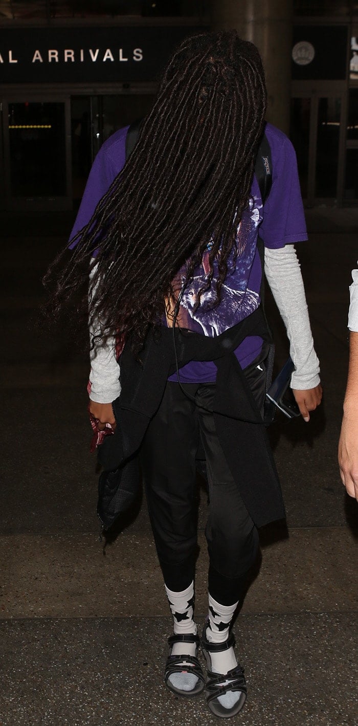 Willow Smith wears dad sandals with printed white socks at LAX on July 28, 2017