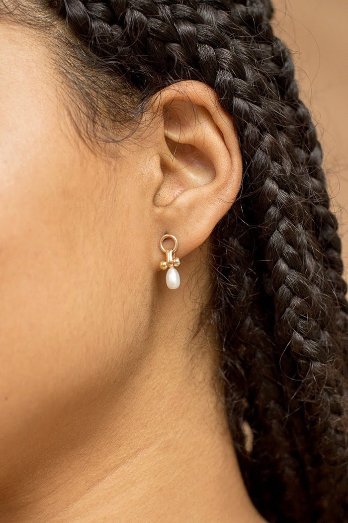 Little Luck studs feature a brass stud with an upcycled pearl drop