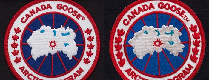 The original Canada Goose logo patch (left) has intricate embroideries with perfectly shaped maple leaves, while the counterfeit (right) has poor detailing, color variations, and errors in the shape of the maple leaves