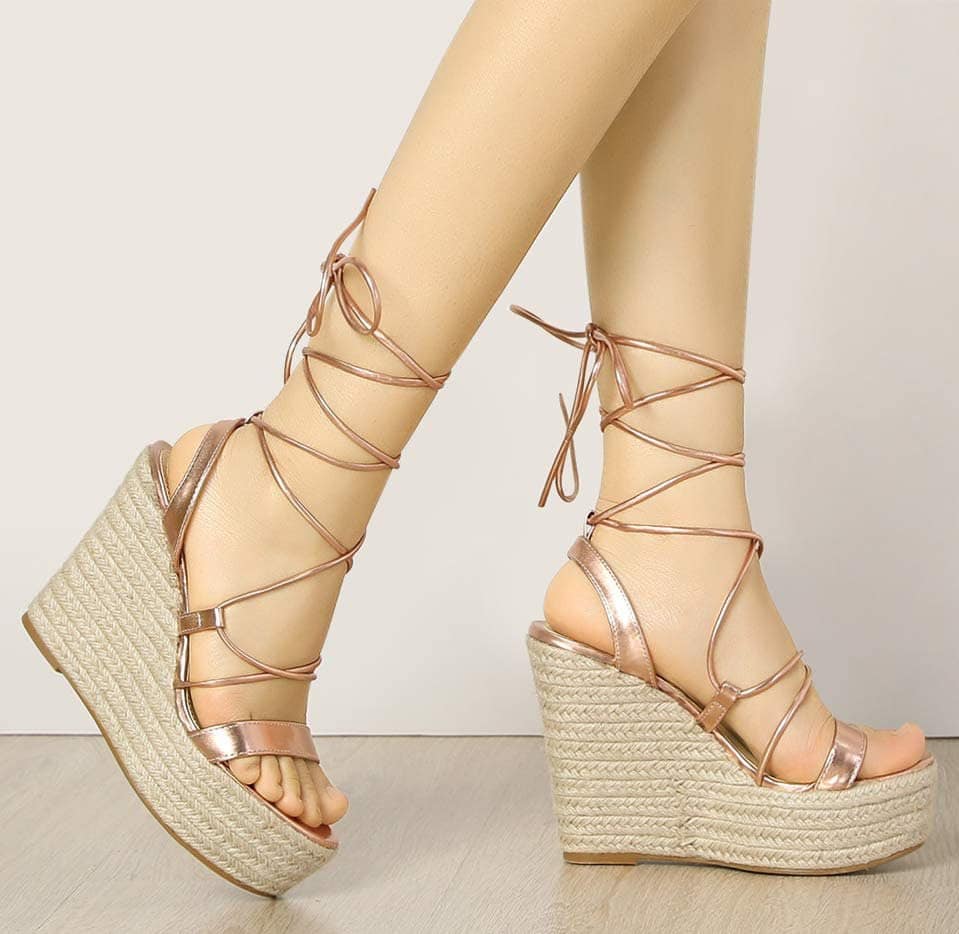 Channel the Bohemian vibe by pairing your midi dresses with lace-up wedge sandals
