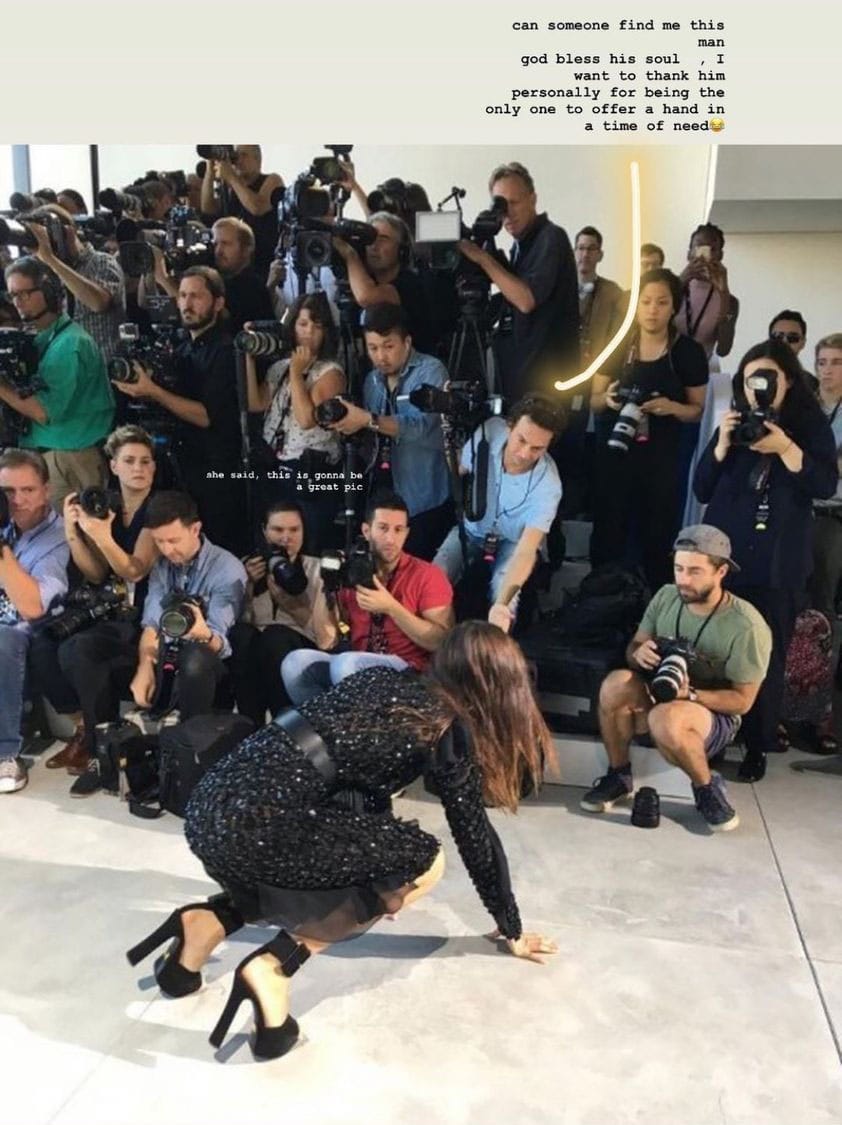 Bella Hadid is looking for the man who helped her get up after tumbling on the runway at Michael Kors' Spring 2017 show