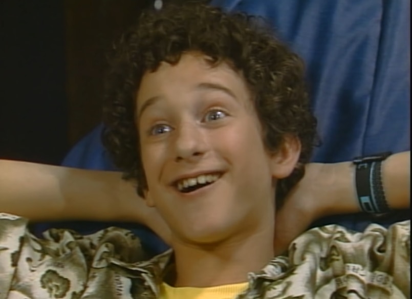 Dustin Diamond as Zack Morris' (Mark-Paul Gosselaar) nerdy friend Samuel "Screech" Powers on Saved by the Bell
