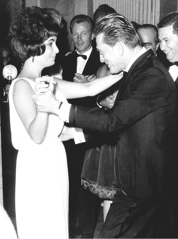 Elizabeth Taylor dancing with Kirk Douglas at the Spartacus premiere after-party in Rome in 1961