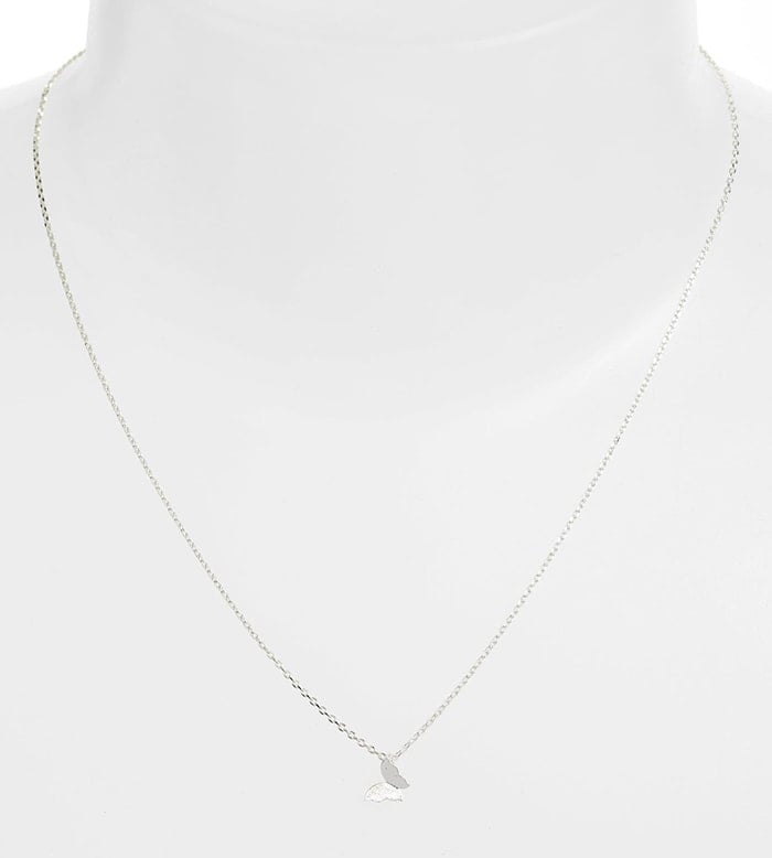 A delicate chain necklace with a simple butterfly pendant from British jewelry brand Estella Bartlett