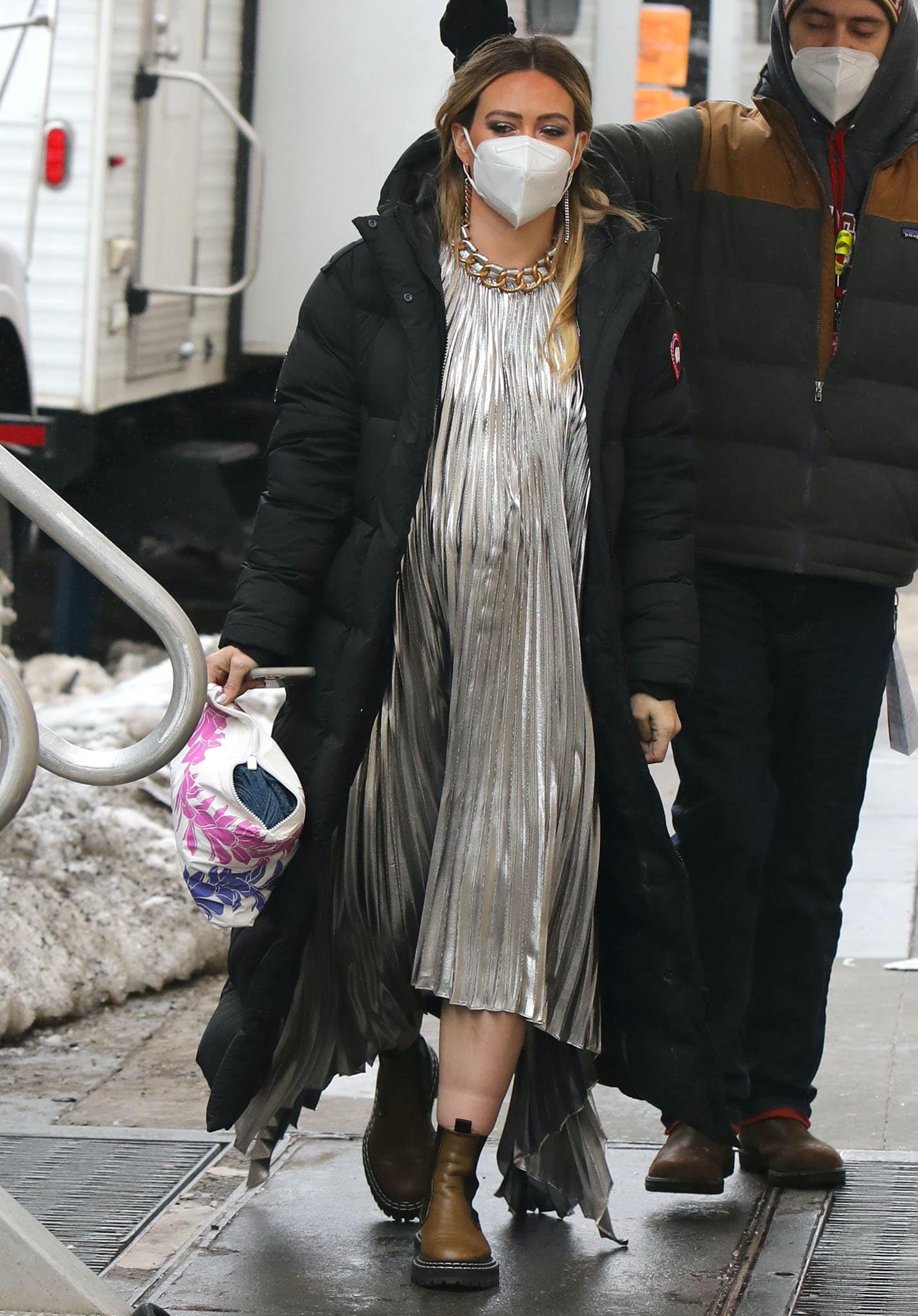 Hilary Duff shines in Givenchy silver pleated dress on February 9, 2021