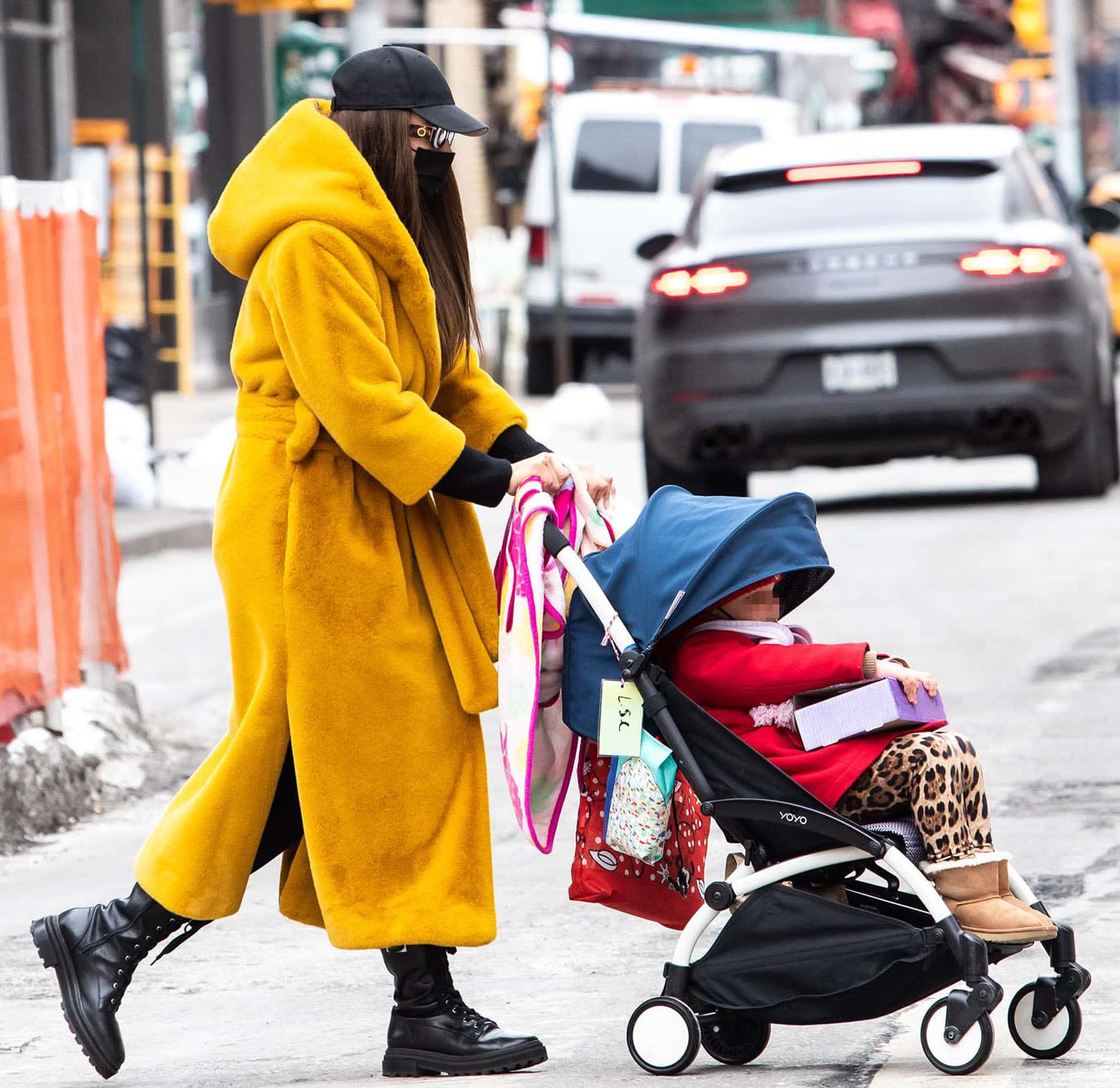 Irina Shayk pushes her daughter's stroller while strolling around Greenwich Village on February 12, 2021
