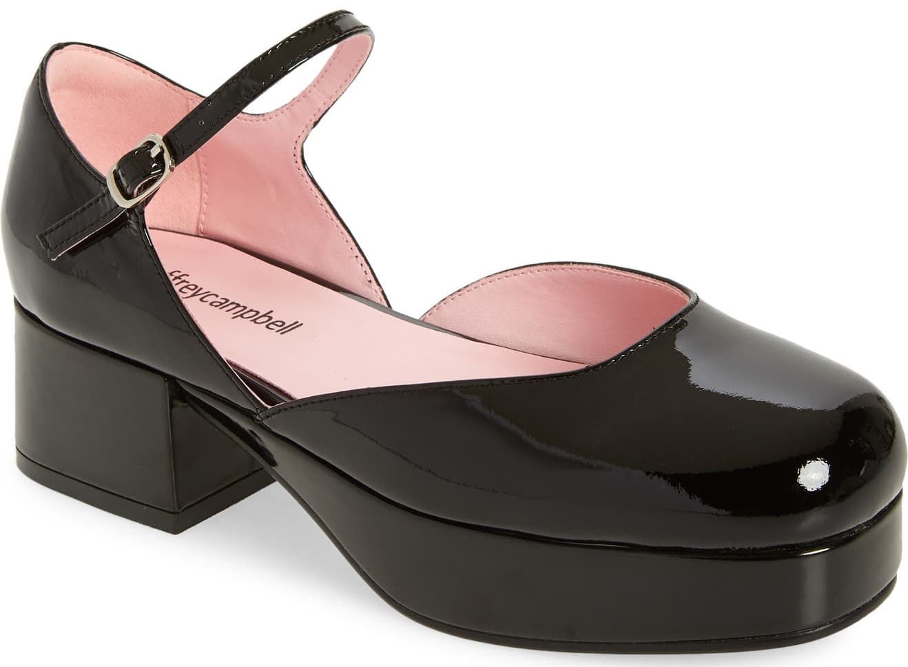 Glossy patent leather intensifies the appeal of a Mary Jane-inspired pump from Jeffrey Campbell set on a blocky heel