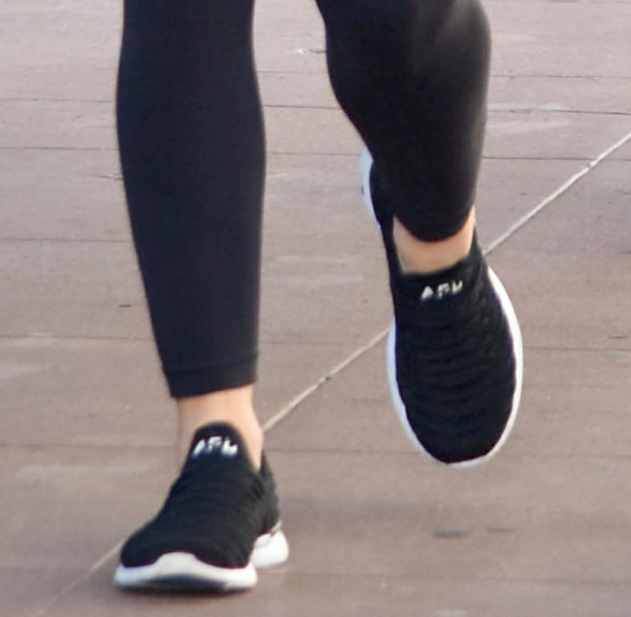 Lucy Hale slips into a pair of APL TechLoom Wave sneakers