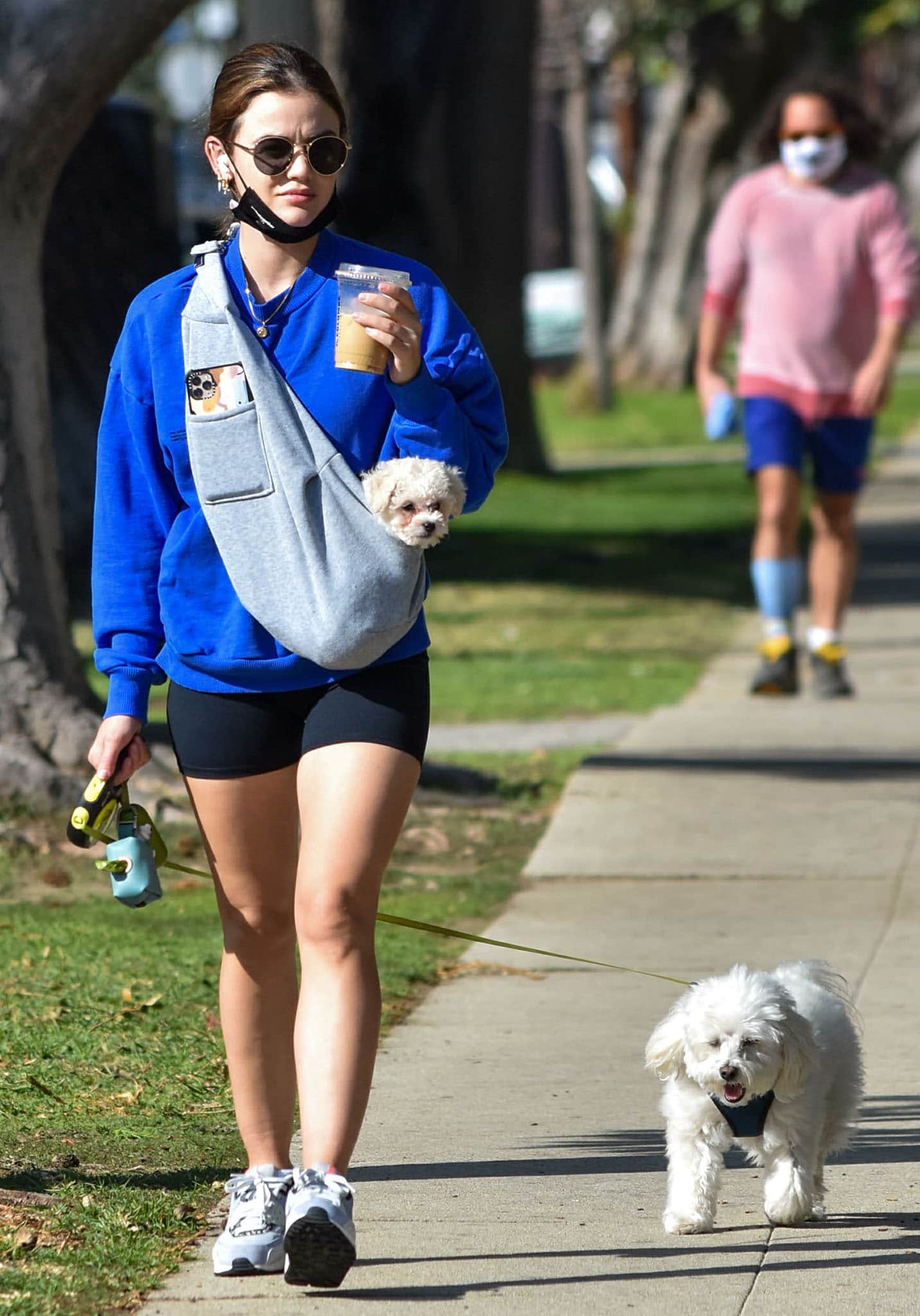 Fur mom Lucy Hale takes her dogs, Ethel and Elvis, out for a walk in Los Angeles on February 11, 2021