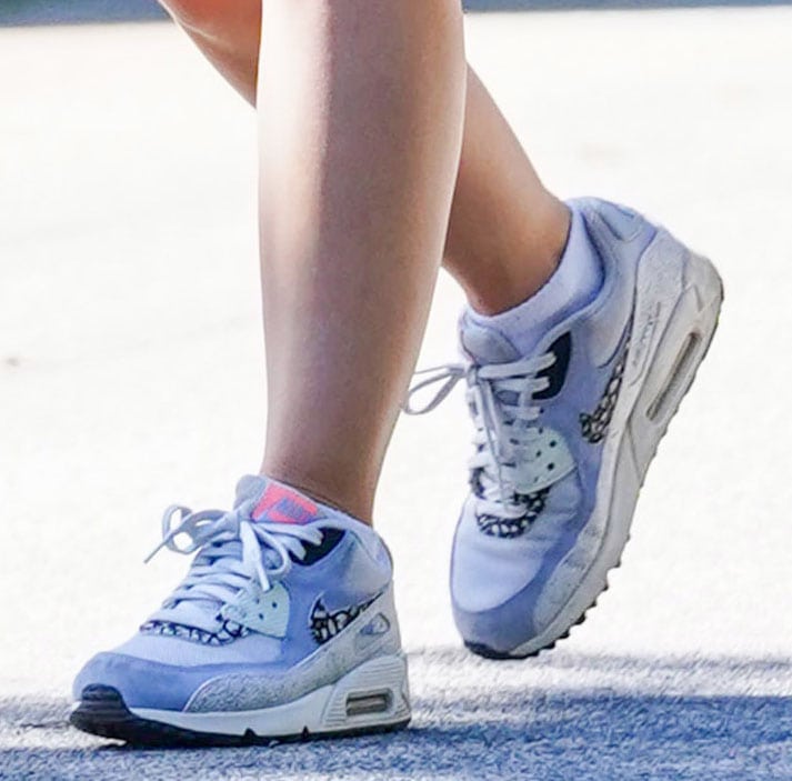 Lucy Hale pairs her chic and girly hiking outfit with Nike Air Max 90S sneakers