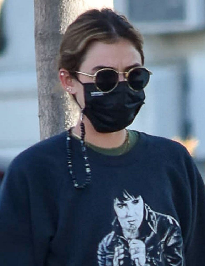 Lucy Hale wears her favorite Paradigm sunglasses and EvolveTogether face mask