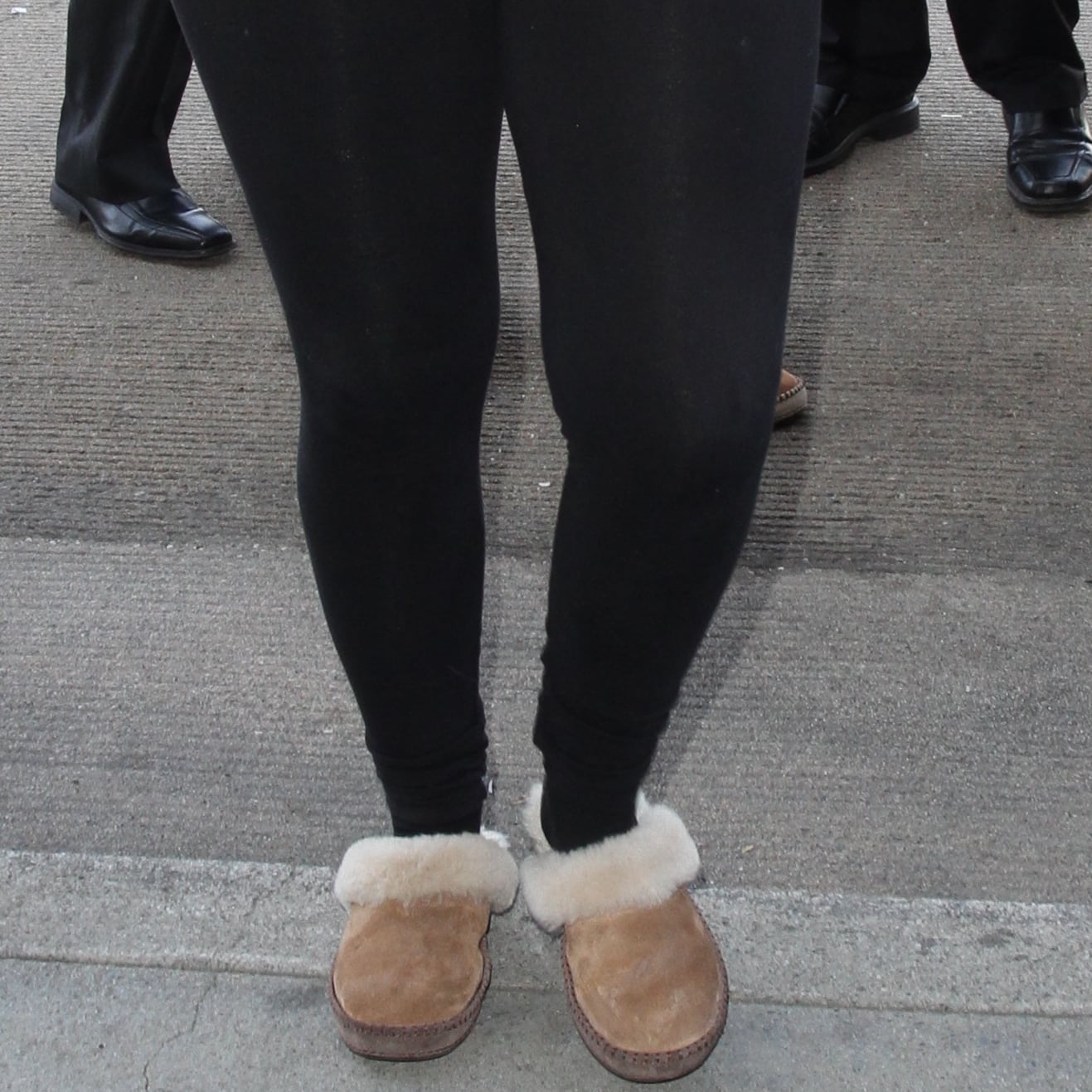 Meghan Trainor wears slippers with leggings