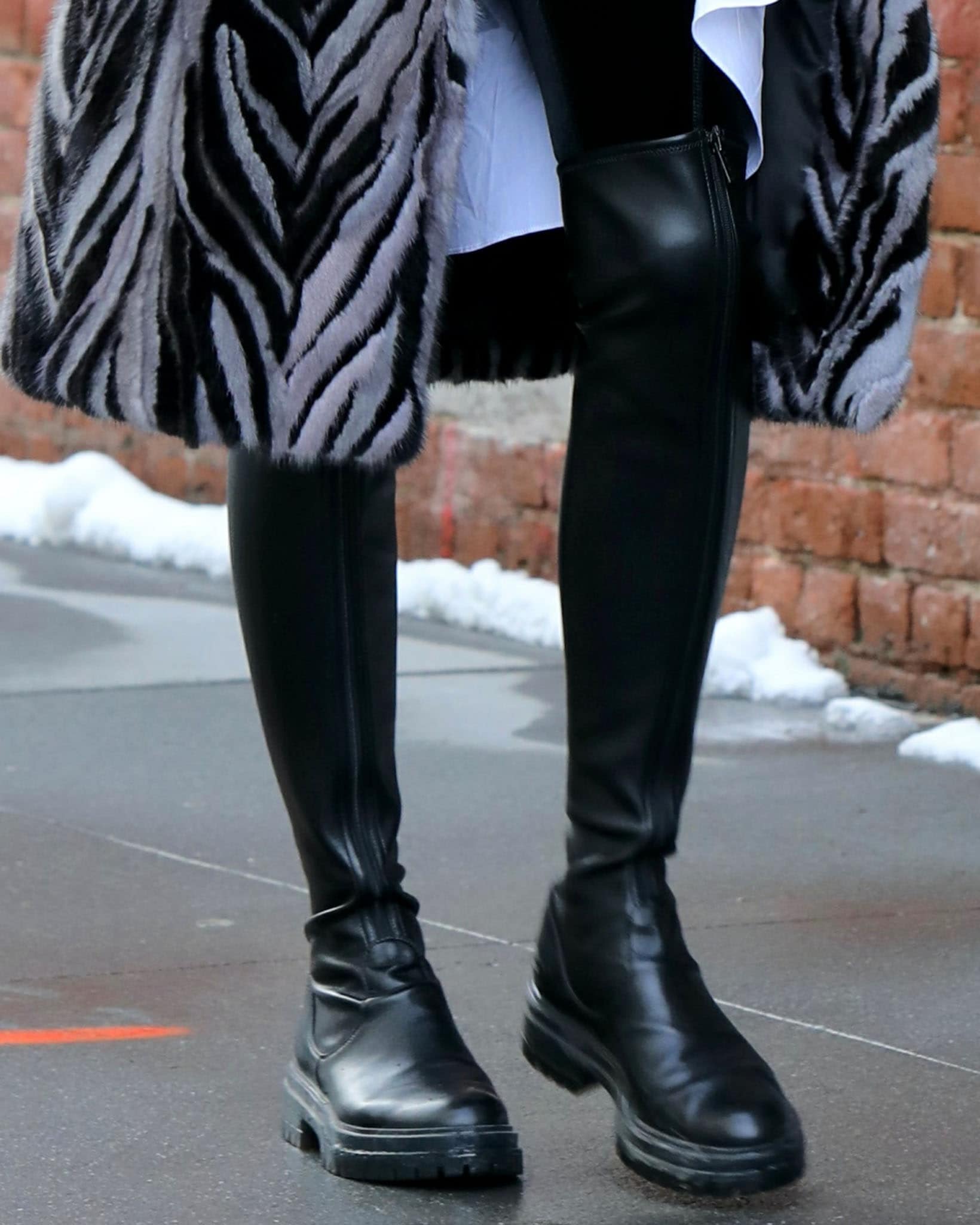 Olivia Palermo's Gianvito Rossi Marsden boots feature a zip fastening along the center front