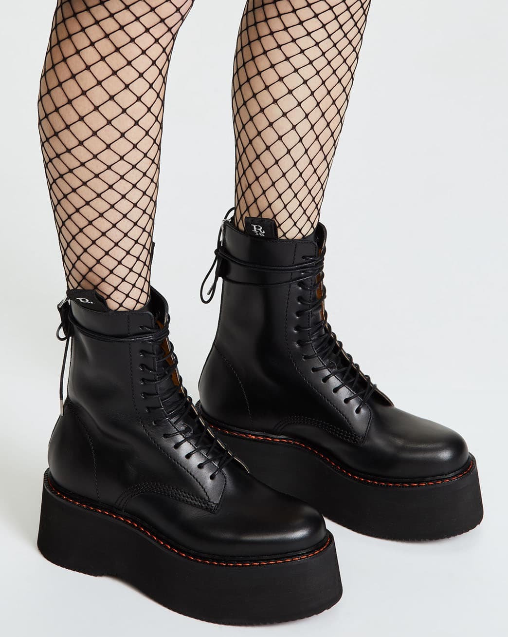 Elevate your rock-chick rebellious look with the R13 combat boots with 2.75-inch platforms