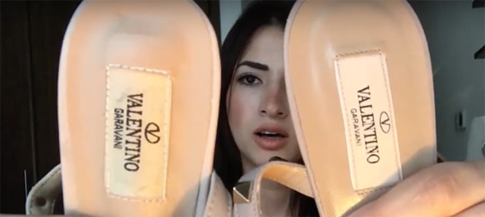 A screenshot from Luxury Talk YouTube channel showing uneven stitches on the fake Valentino sandals (left) and clean, aligned stitches on the real Valentino sandals (right)