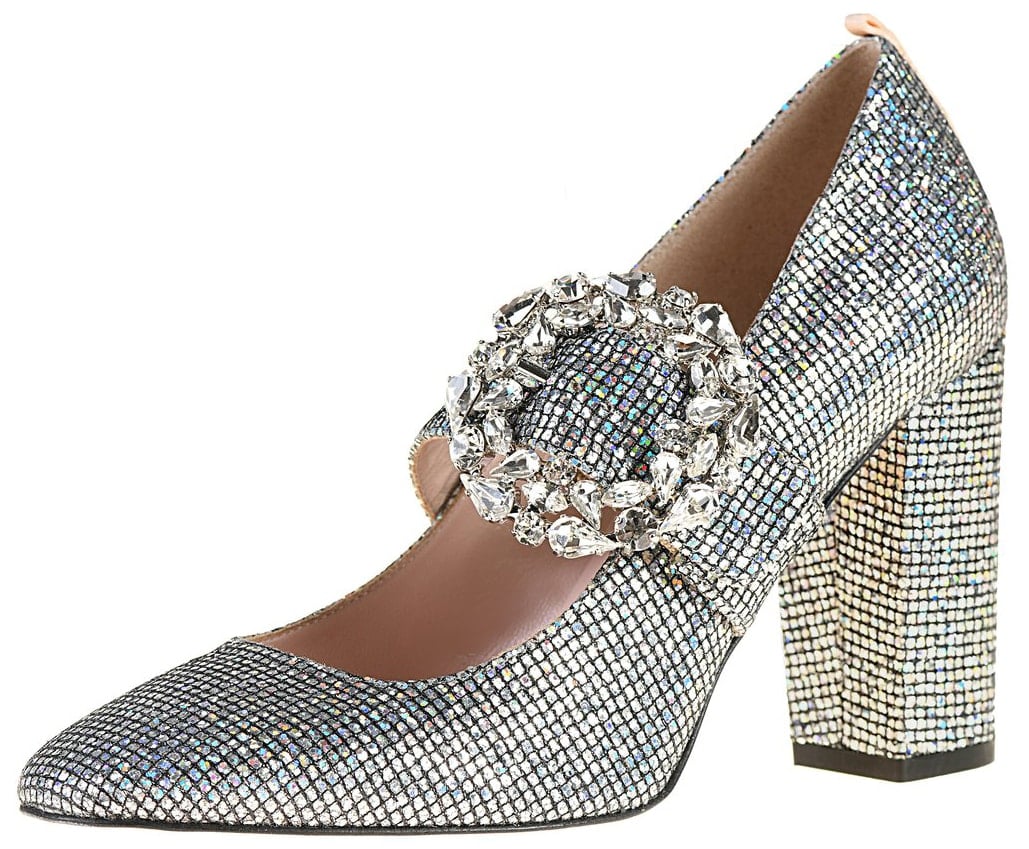 Fabricated SJP by Sarah Jessica Parker almond-toe pumps in a slip-on style with rhinestone-encrusted buckle closure