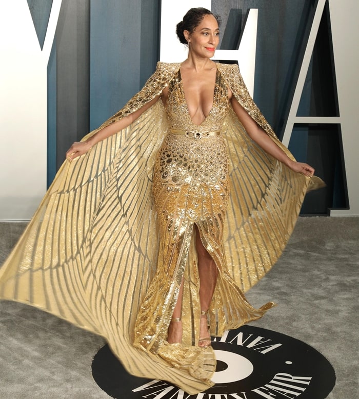 Tracee Ellis Ross in a gold Zuhair Murad gown at the 2020 Vanity Fair Oscar Party Celebrating the 92nd Annual Academy Awards hosted by Radhika Jones at Wallis Annenberg Center for the Performing Arts on February 9, 2020, in Beverly Hills, California