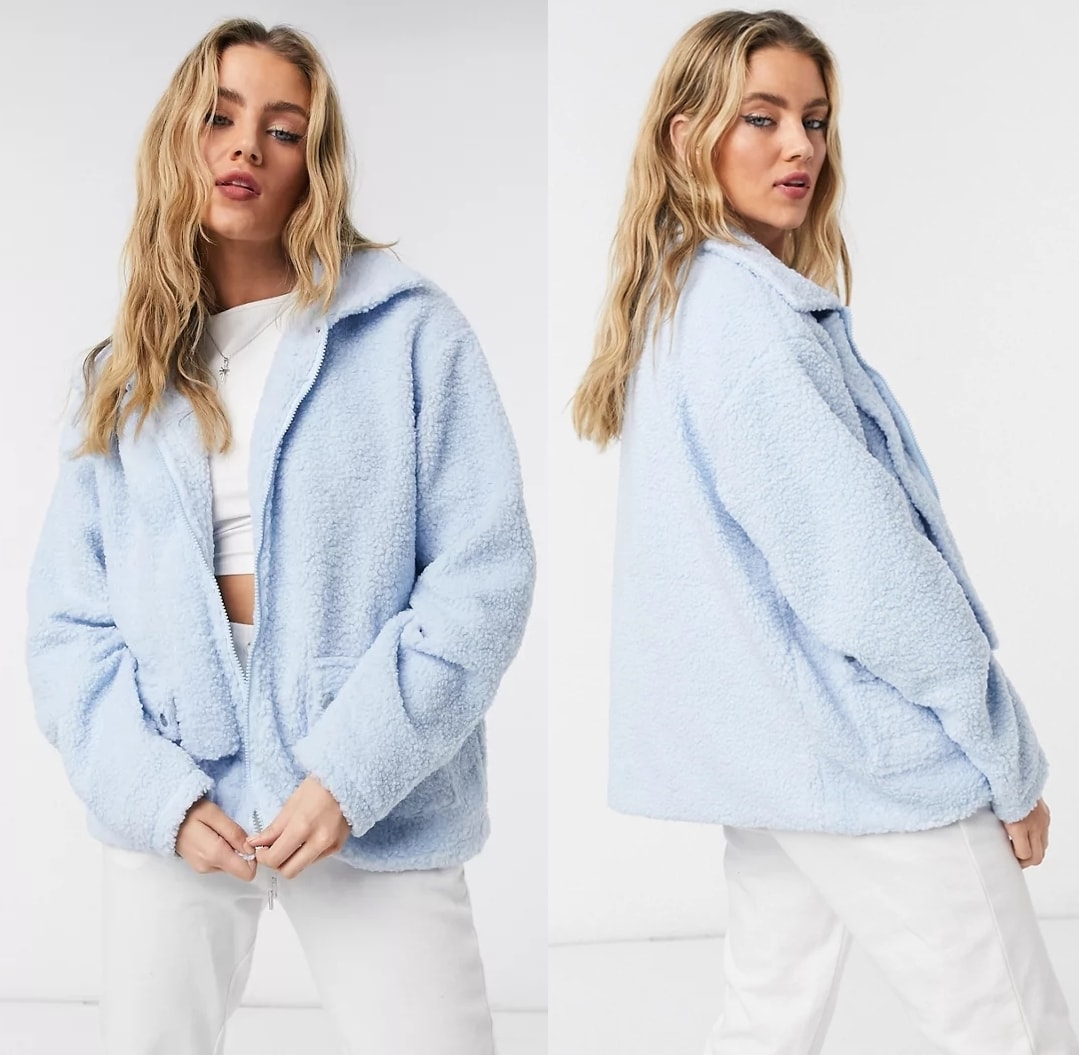 Light blue jacket with pocket detail in teddy fleece