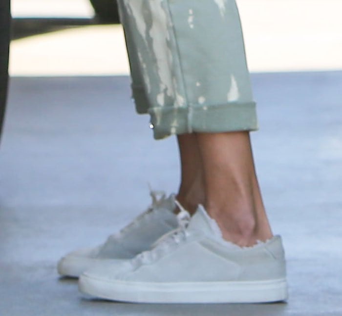 Alessandra Ambrosio wears her favorite Common Projects retro low shearling-lined sneakers