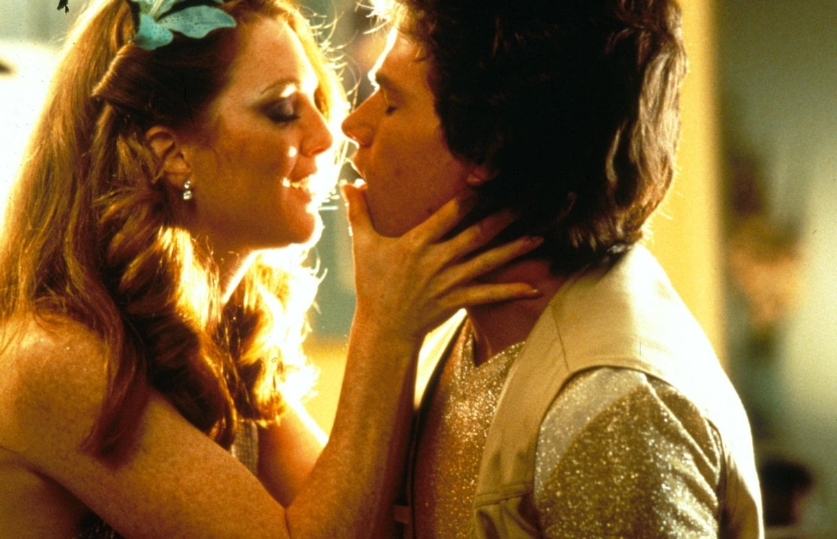 In "Boogie Nights," Mark Wahlberg stars as Eddie Adams/Dirk Diggler alongside Julianne Moore as Amber Waves, exploring the 1970s adult film industry