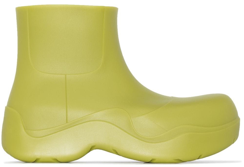 Turn heads in the Bottega Veneta BV Puddle ankle boots, featuring a seamless rubber construction with chunky soles