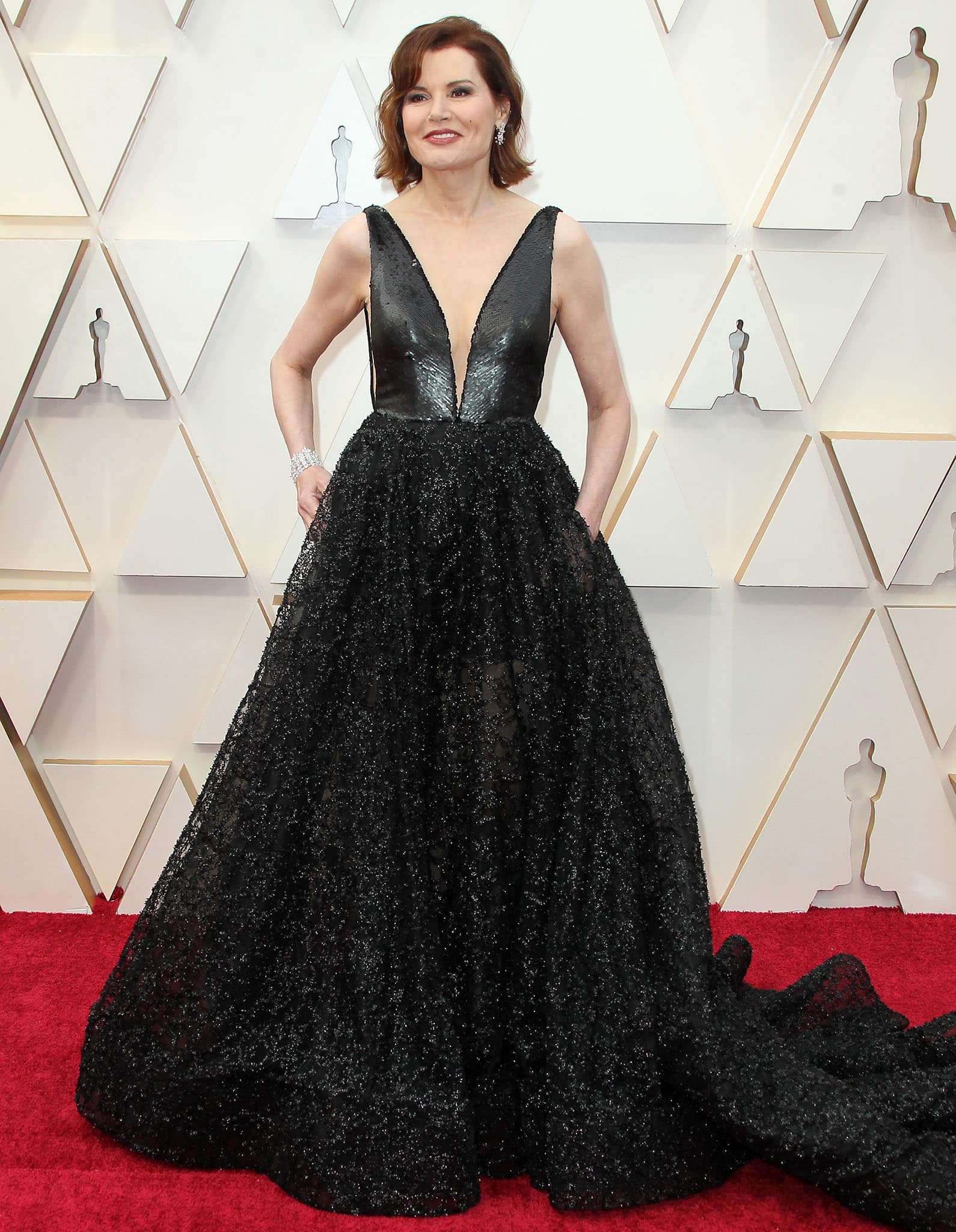 Geena Davis wears Romona Keveža plunging gown at the 92nd Academy Awards on February 9, 2020