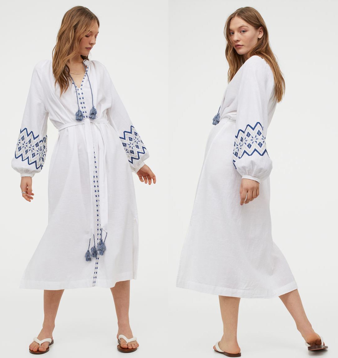 A lightweight kaftan dress made from woven cotton fabric with embroideries, tassels, and raglan balloon sleeves