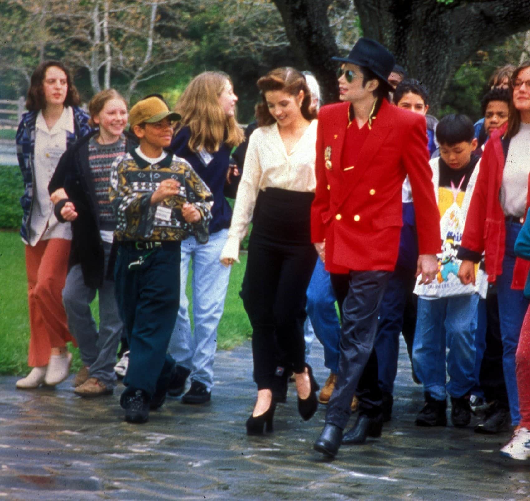 Lisa Marie Presley and Michael Jackson at Neverland Ranch during a VIP visit by a group of children