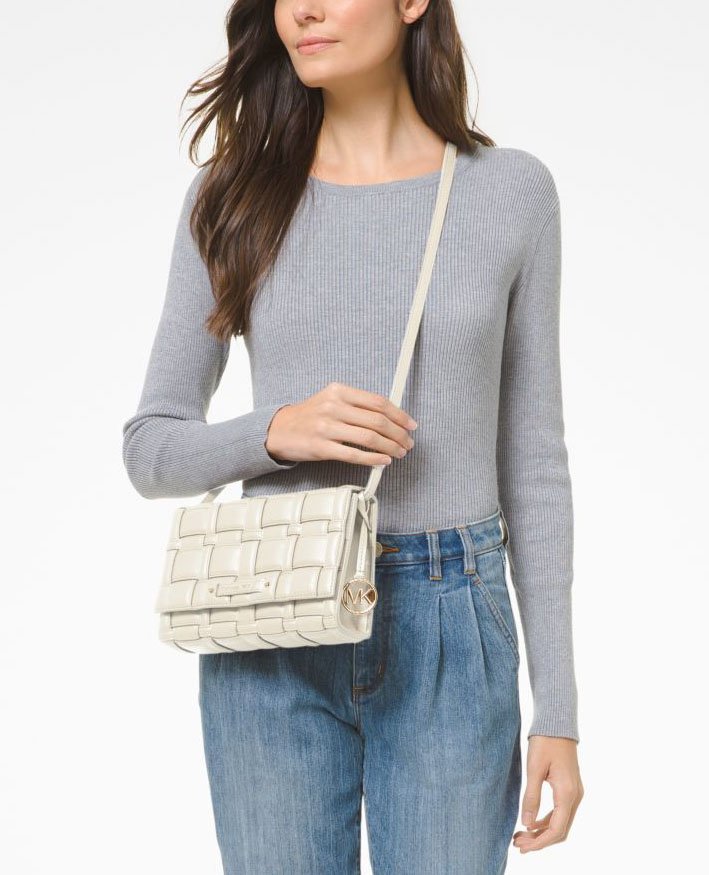 It's a crossbody bag with a roomy interior to carry your day to evening essentials