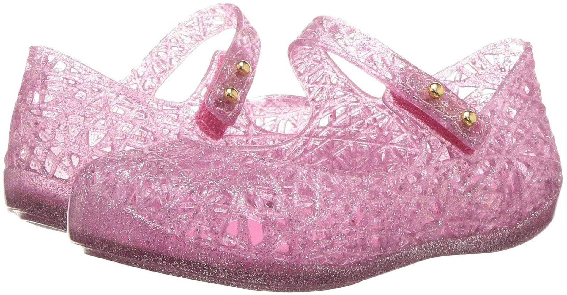 Toddlers will love the cute and comfy Melissa Mini Campana VI jelly shoes in girly pink color