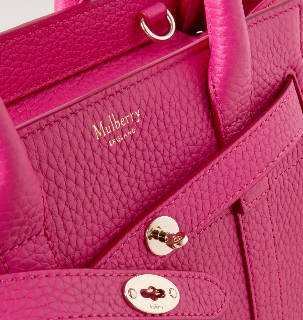 The Mulberry logo uses a custom typeface that is elegant and sophisticated, reflecting the brand's high-end fashion identity