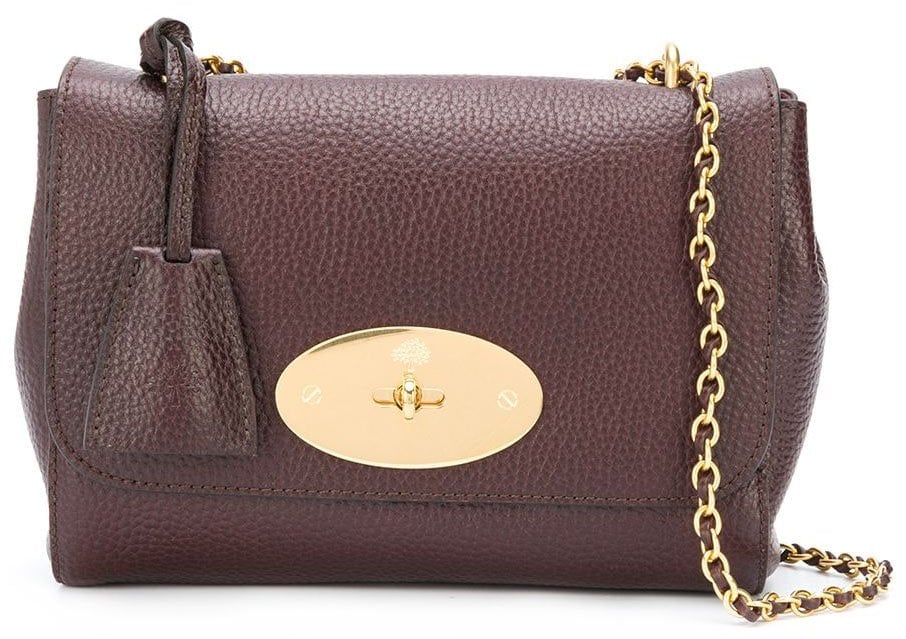 The elegant Mulberry Lily features a logo plaque with a postman lock and a chain-and-leather strap