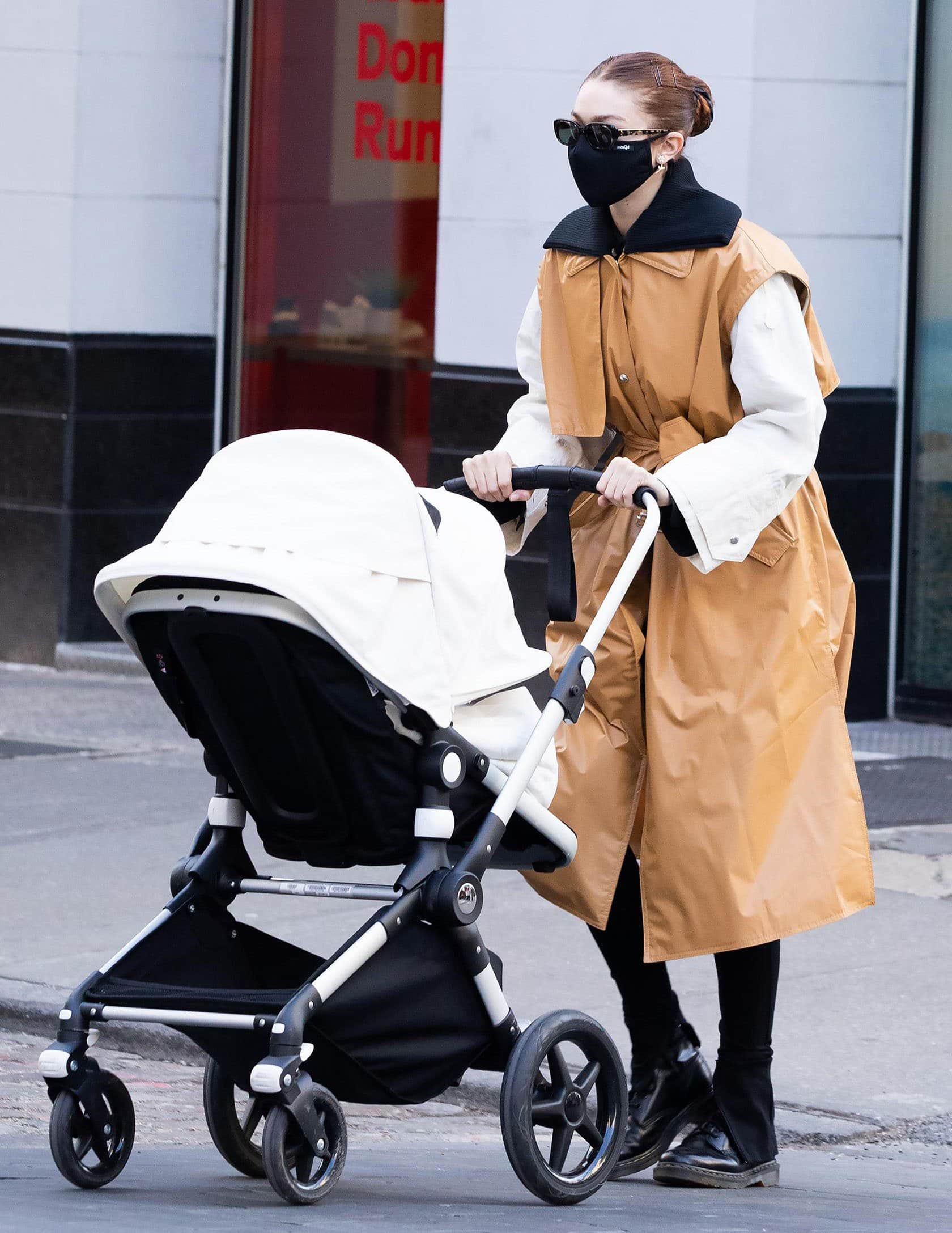 Gigi Hadid stuns in a Moncler Genius 2 Moncler 1952 Coral trench coat