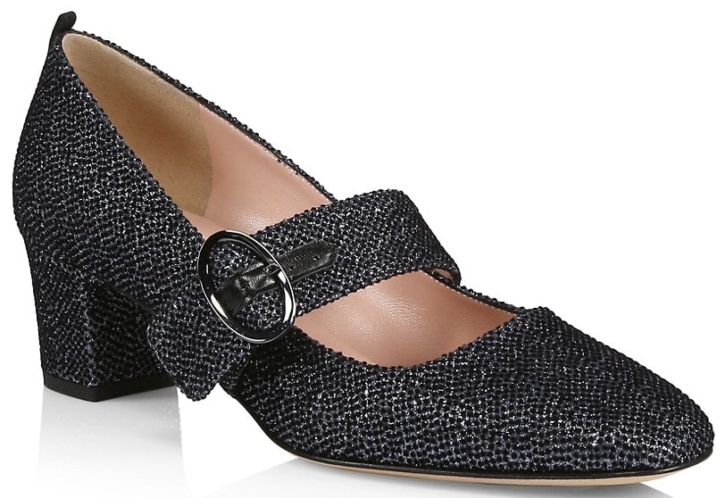 Made from glitter fabric, the Tartt Mary Jane pumps feature a wide buckled strap with almond toes and short block heels