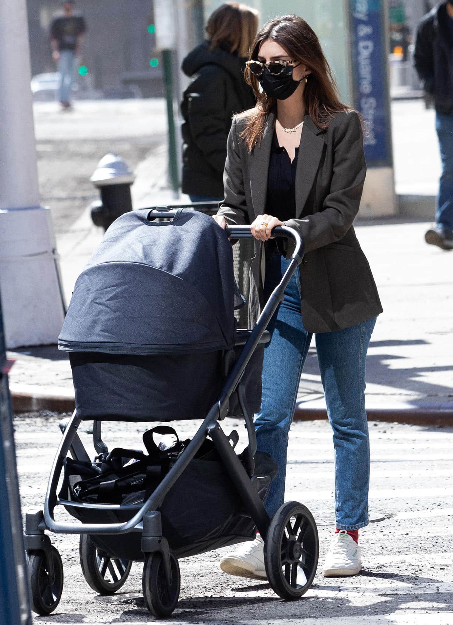 New mom Emily Ratajkowski pushes her newborn son in Uppababy stroller