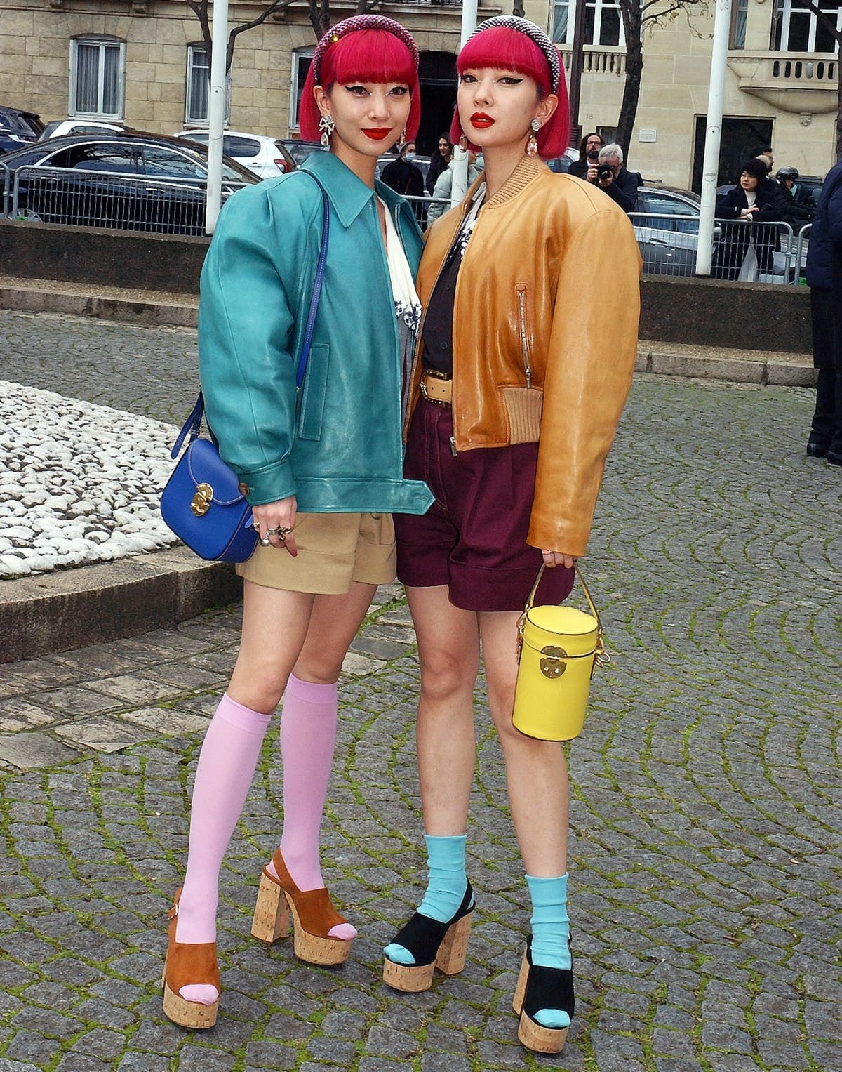 Twin sisters Ami Suzuki and Aya Suzuki attend the Miu Miu show